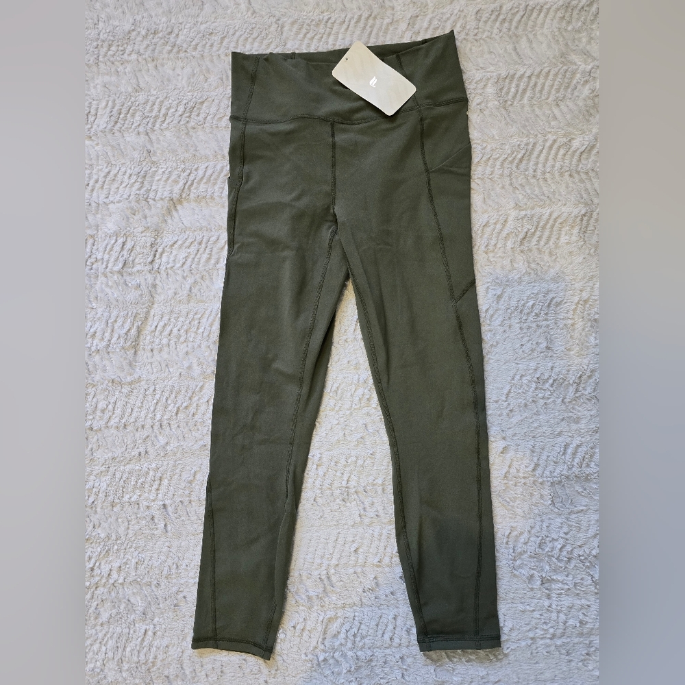 Fabletics olive green 7/8 length leggings with pockets.